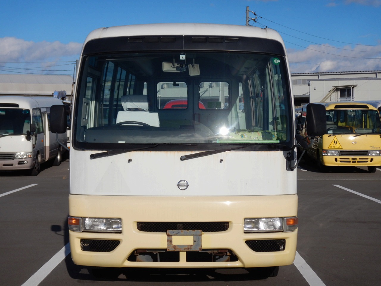 Xe du lịch Nissan Coaster 24 chỗ