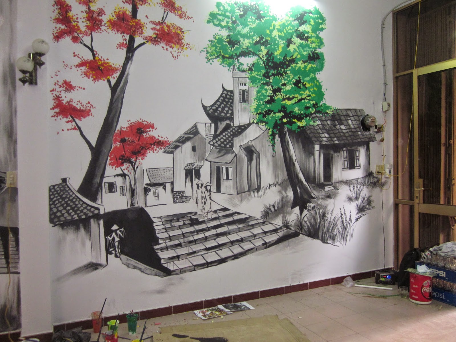 Tranh vẽ tường được nhiều người sử dụng trong các quán cafe